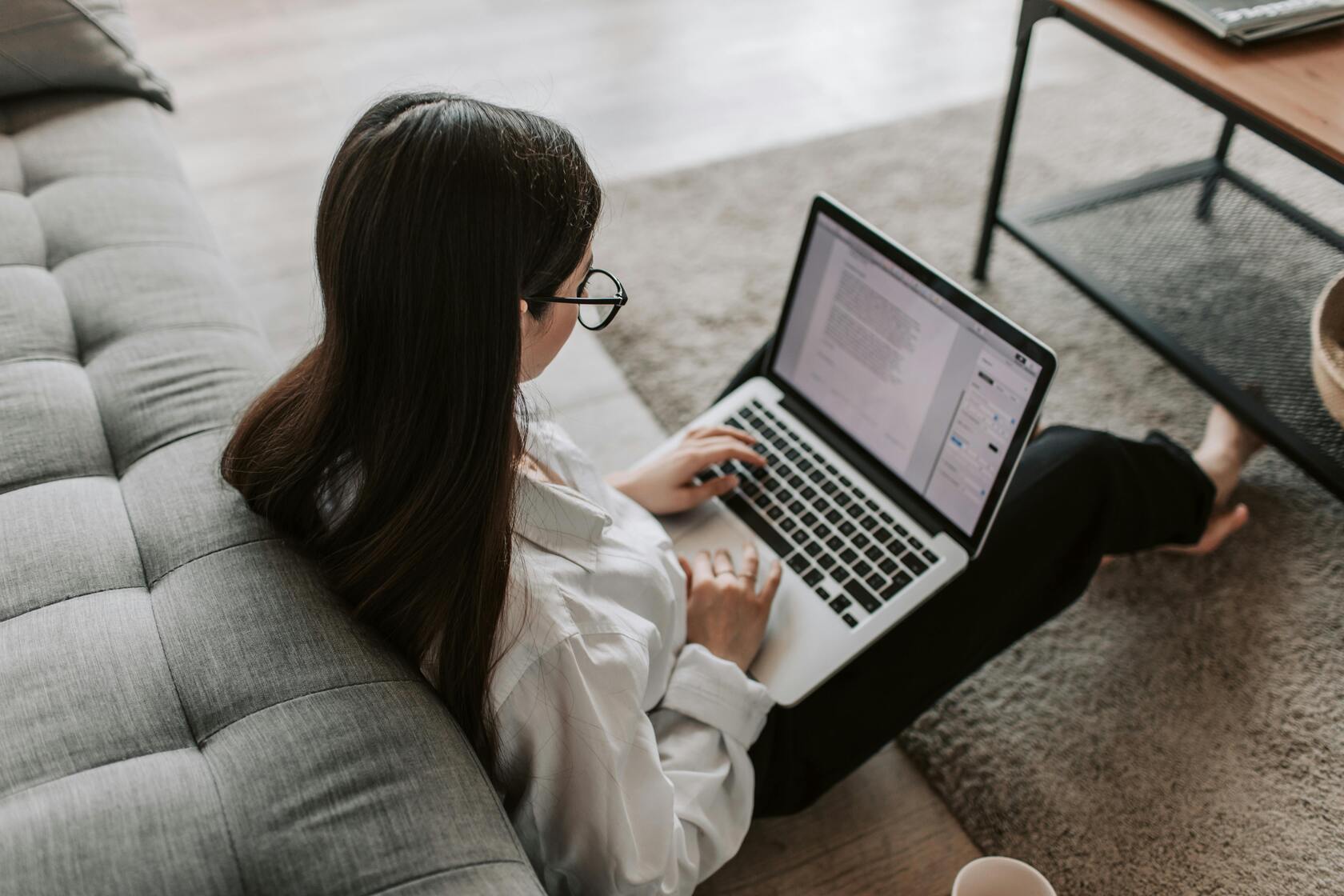 Woman Working At Home Using Her Laptop · Free Stock Photo